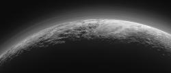 Pluto's Majestic Mountains, Frozen Plains and Foggy Hazes: