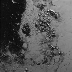 A Mountain Range within Pluto’s ‘Heart’