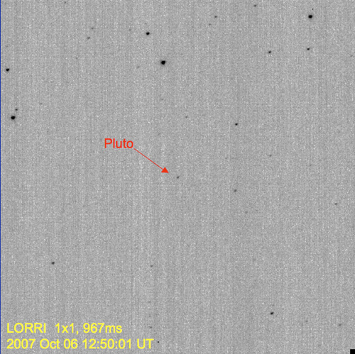 An image demonstrating the first detection of Pluto using LORRI's high-resolution mode, which provides a clear separation between Pluto and numerous nearby background stars.